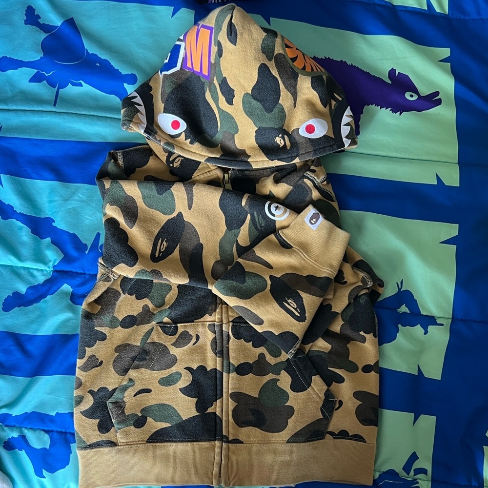 Bape Kids by A Bathing Ape Camouflage Zip-Up Hoodie…front zipper and pockets.